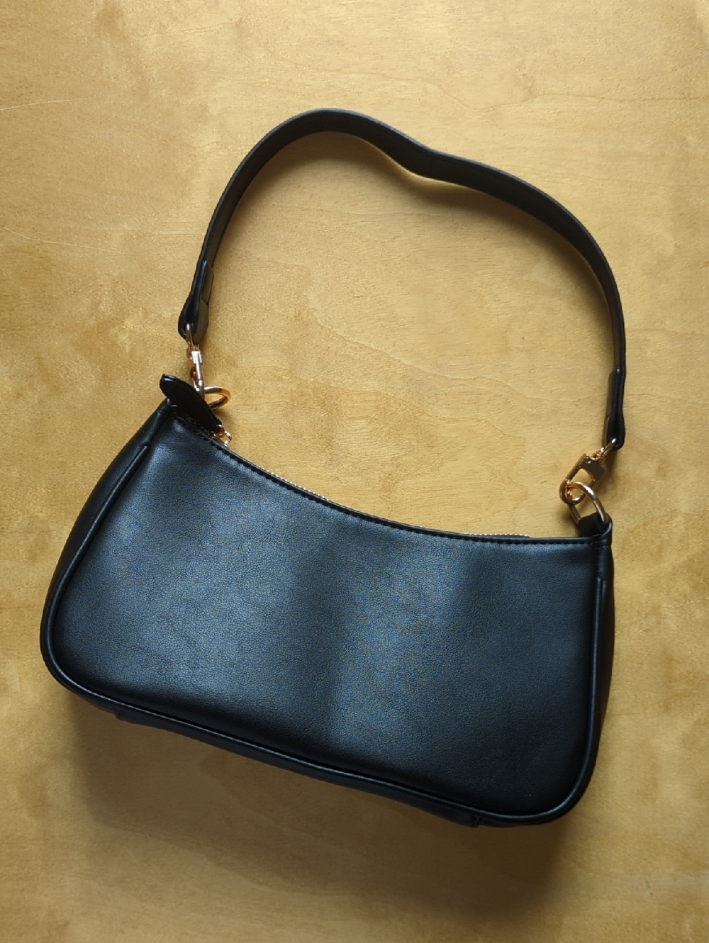 Amazon Black Shoulder Bag with Gold Hardware